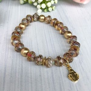 Beautiful beaded bracelet with a mother Mary charm
